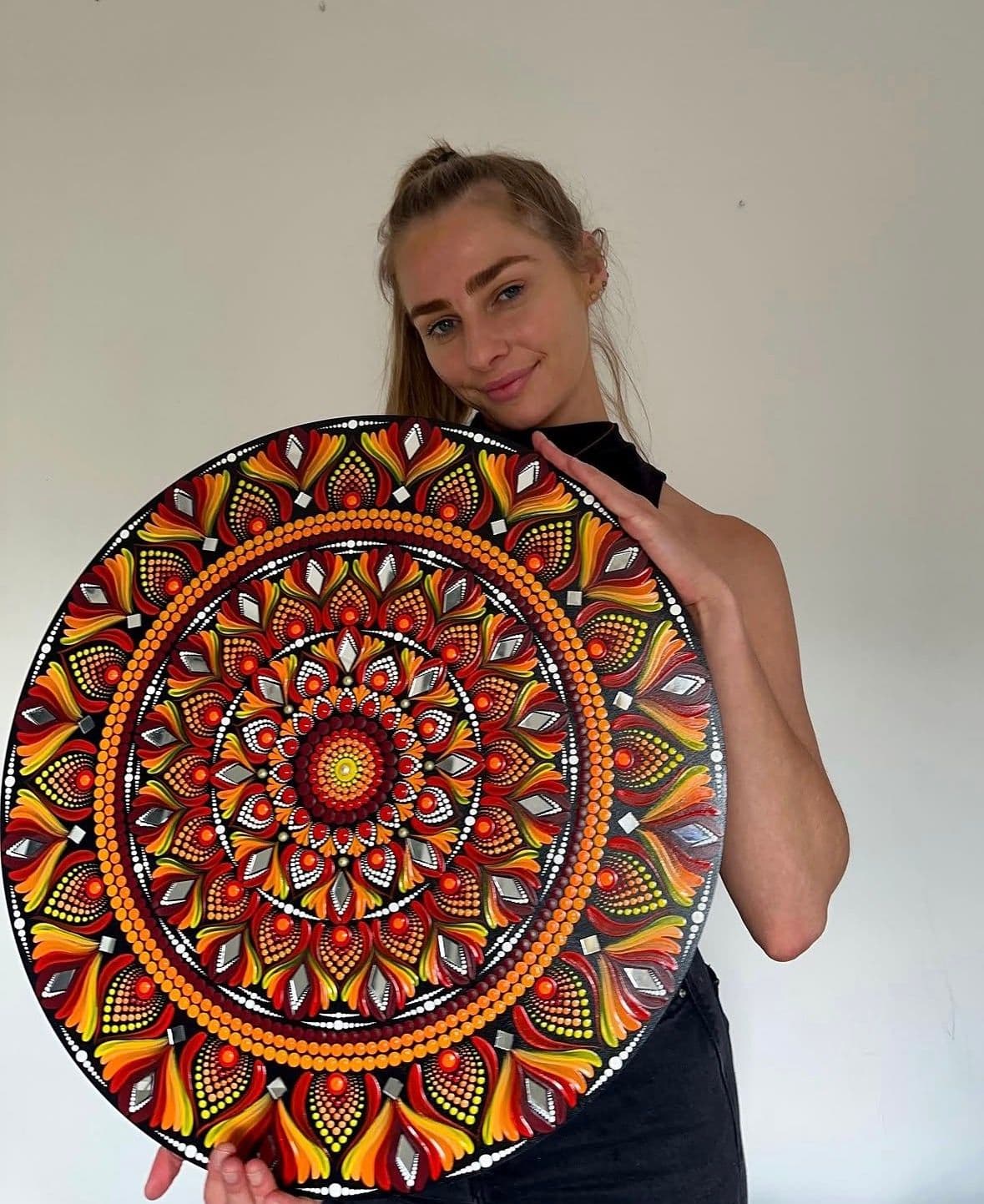 Cheryl painting a mandala